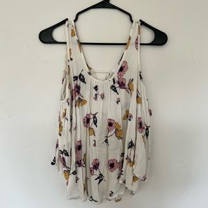 Long sleeve open shoulder floral shirt size M